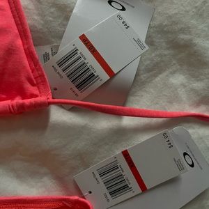Oakley bikini. Coral colour. Size xs. Top and bottom.